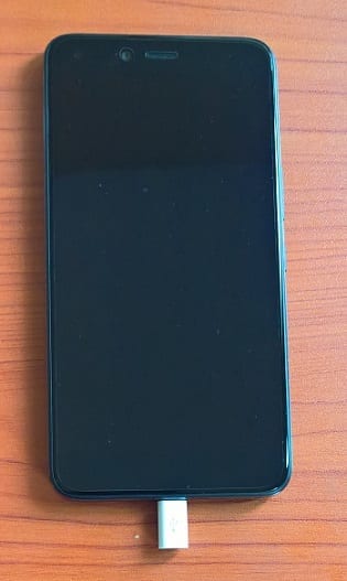 USB Type C adapter connected to the Infinix Zero 5