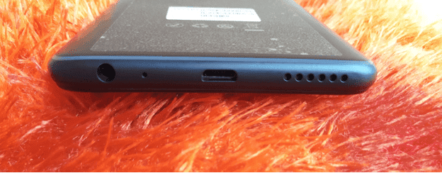 Camon X Bottom side showing the microSD port, speaker, mouthpiece, and 3.5mm audio jack