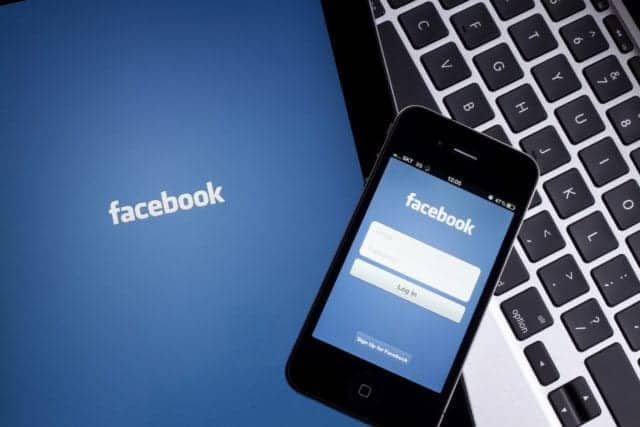 Facebook on Digital Tablet Buying a Phone on Facebook