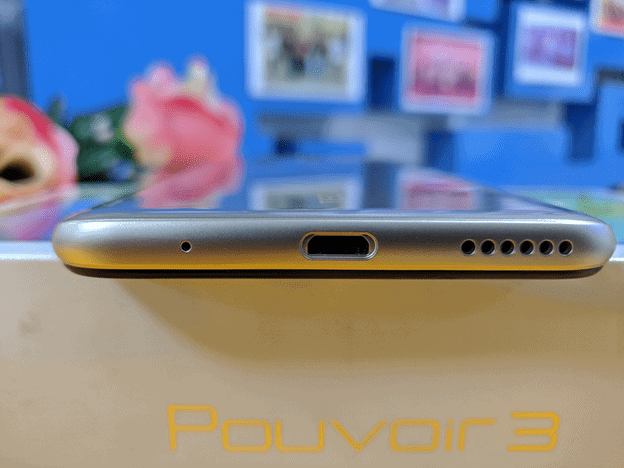 Tecno Pouvoir 3 bottom side showing the USB port and speaker