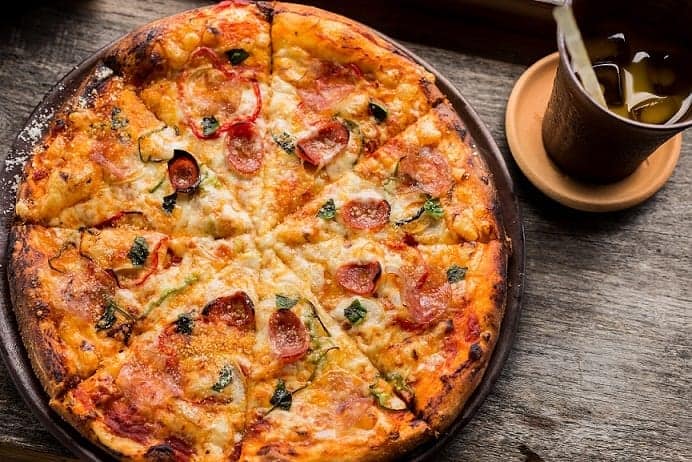 OFood Food Delivery Service offers Pizza among other Delicacies