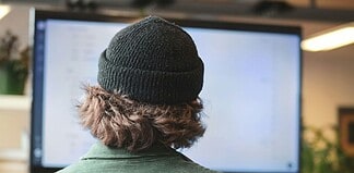 Why Some PDFs Convert Poorly and How to Fix It Person Viewing PDFs on a Desktop