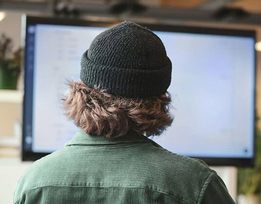 Person Viewing PDFs on a Desktop