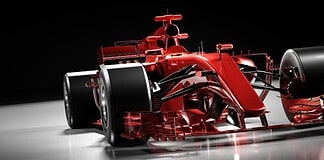 Fast red F1 car on black background