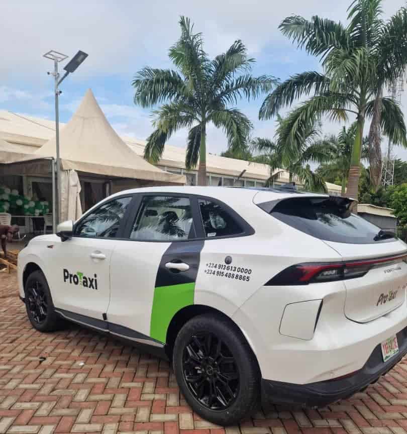 White taxi with ProTaxi branding