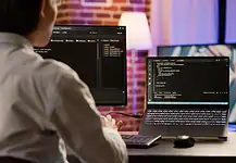 What Player Account Management Does for a Casino Specialist at a computer managing player accounts with an online casino provider