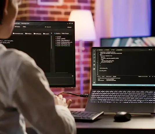 What Player Account Management Does for a Casino Specialist at a computer managing player accounts with an online casino provider